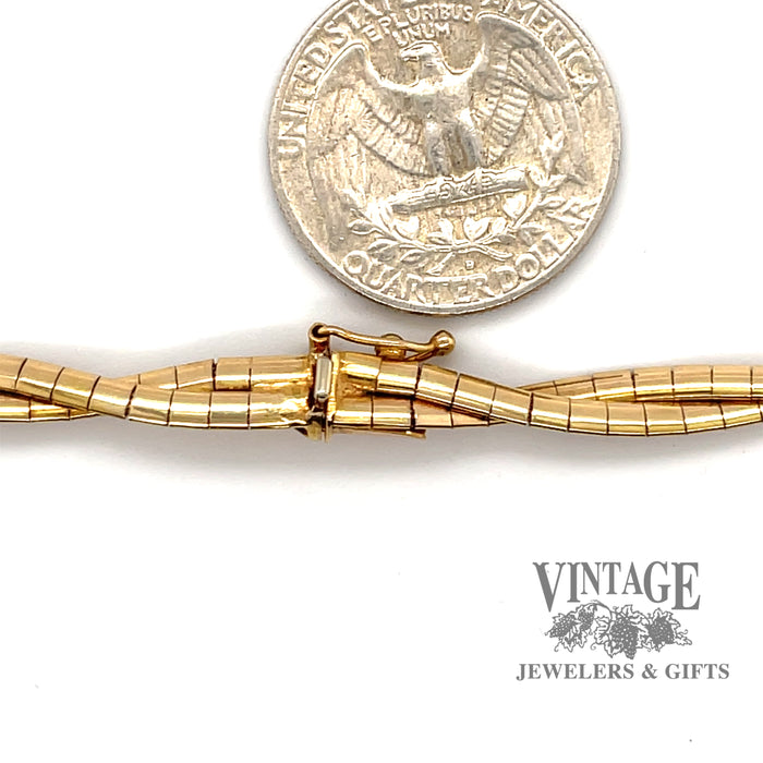 14 karat yellow gold 16.5" Braided omega chain necklace, close up of clasp & next to quarter for size reference