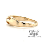 14 karat yellow gold .16 carat Old European Cut diamond vintage belcher ring, side view