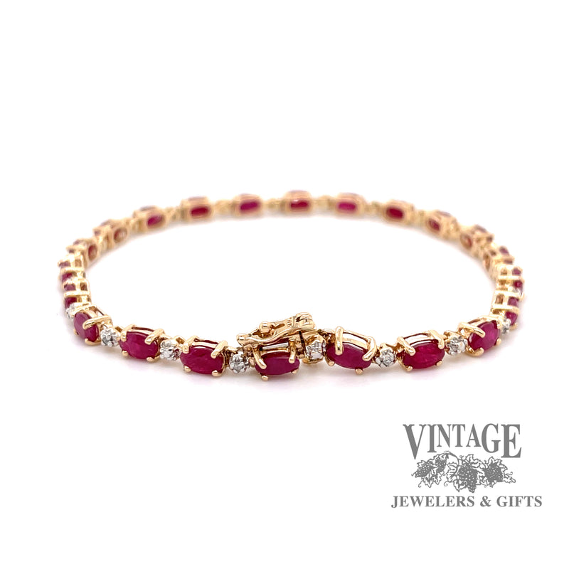 14 karat yellow gold ruby and diamond tennis bracelet