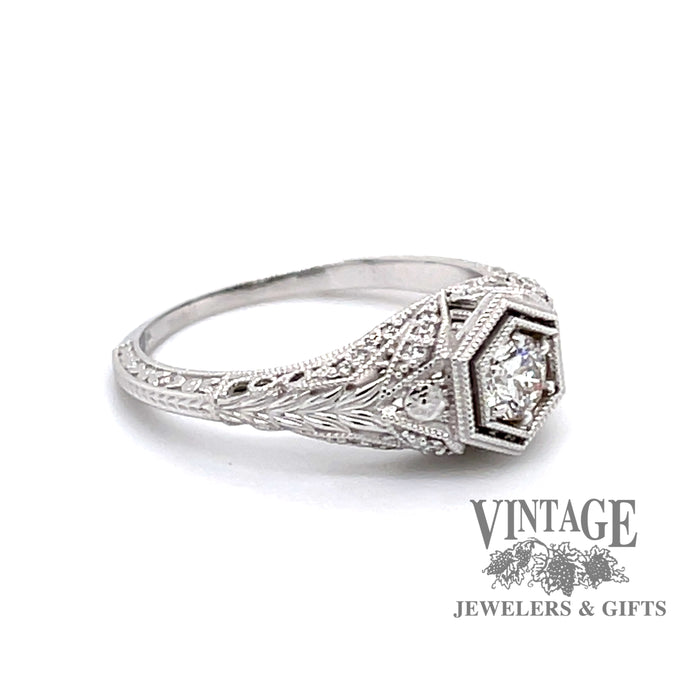 Edwardian inspired 14 karat white gold ring with .25ct diamond center, angled side view
