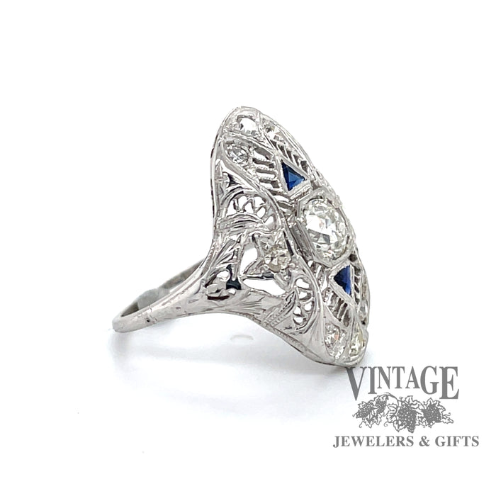 Vintage 18k white gold filigree OEC diamond and sapphire ring, angled front/side view