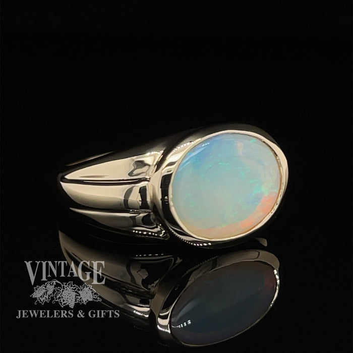 14 karat yellow gold 3.8ct oval opal signet style ring, angled view