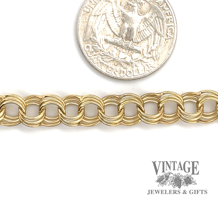 Yellow gold triple link charm bracelet