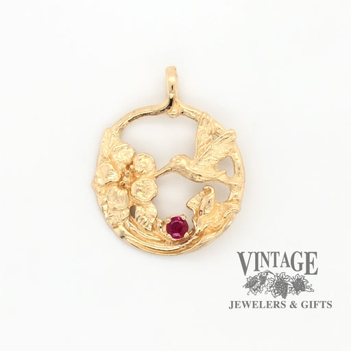 14k gold ruby hummingbird pendant, front view.