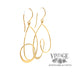 Angled view of 14 karat yellow gold spiral drop earrings