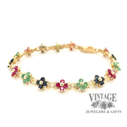 14 karat yellow gold Ruby, emerald and sapphire floral cluster link bracelet