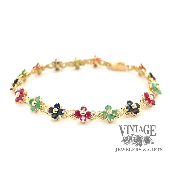 14 karat yellow gold Ruby, emerald and sapphire floral cluster link bracelet