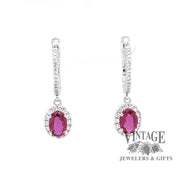 14 karat white gold oval ruby and diamond halo drop earrings