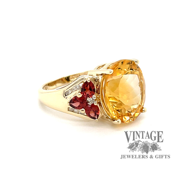 10 karat yellow gold estate oval golden citrine ring with pear shape madeira citrine accents, angled view