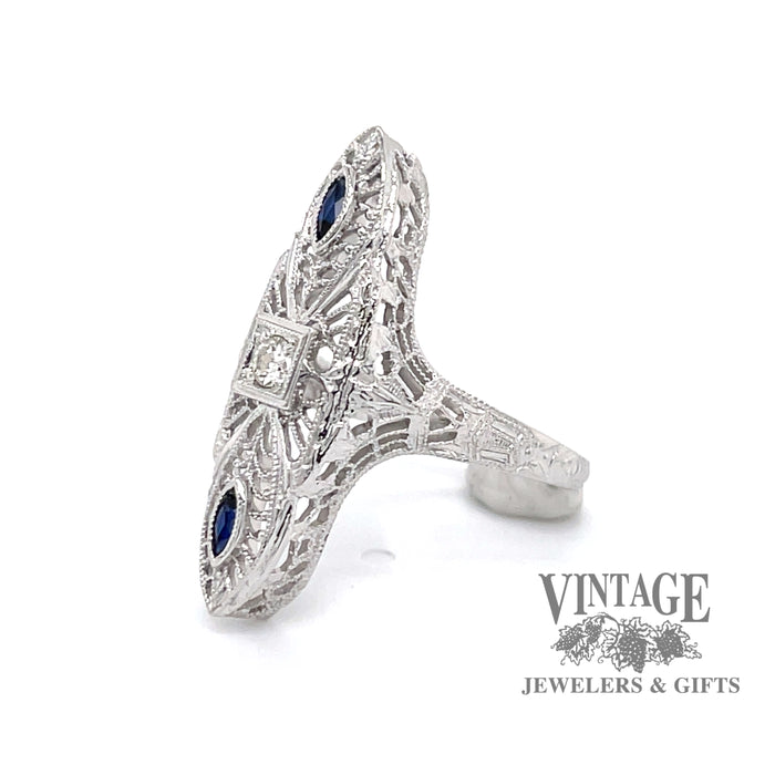 18 karat white gold vintage filigree elongated sapphire and diamond ring, angled view