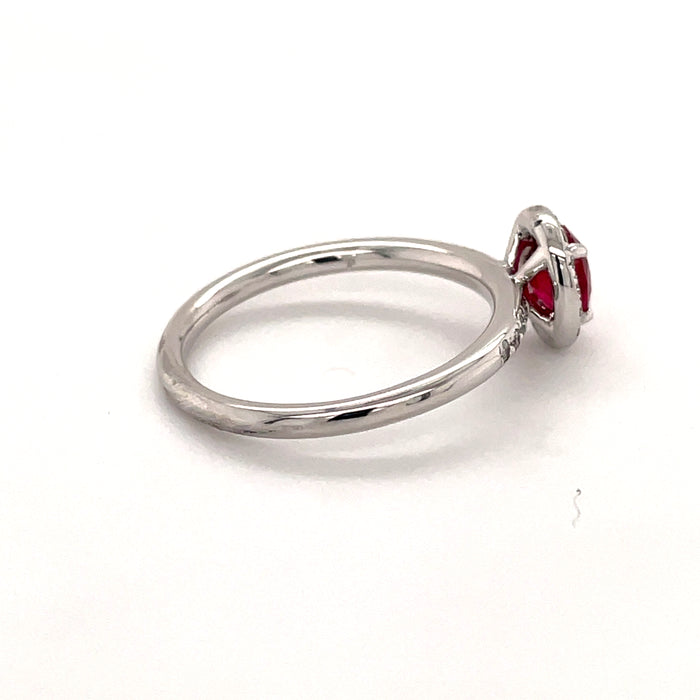 14 karat white gold oval ruby diamond halo ring, side view