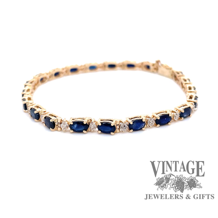 14 karat yellow gold sapphire and diamond tennis bracelet
