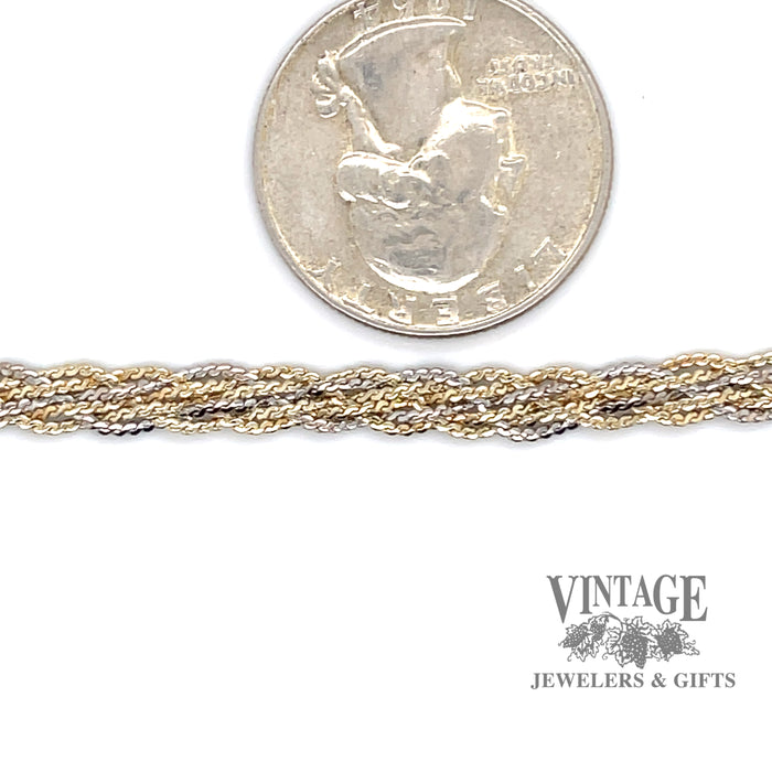 14 karat two-tone gold 20.5" braided serpentine chain necklace, shown with quarter for size reference
