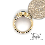 18 karat yellow gold & platinum 1.15 carat Sapphire and 1.02 carat total weight diamond 3-stone ring, side view shown with quarter for size reference