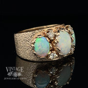 14 karat yellow gold three stone crystal opal and diamond ring, angled view
