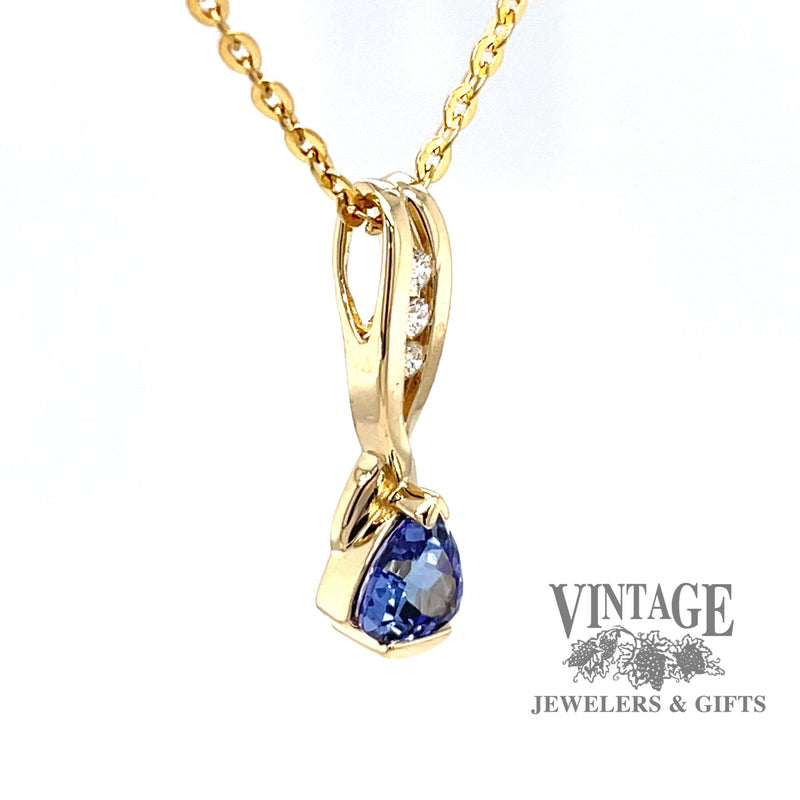 Trillion tanzanite and diamond 14ky gold pendant angled