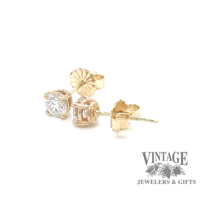 14 karat yellow gold diamond stud earrings