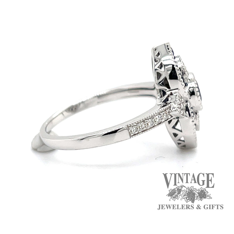 14 karat white gold .63 carat total weight natural blue sapphire and diamond ring, side view