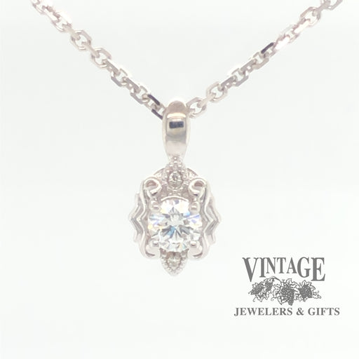 Embossed 14 karat white gold diamond pendant, front view