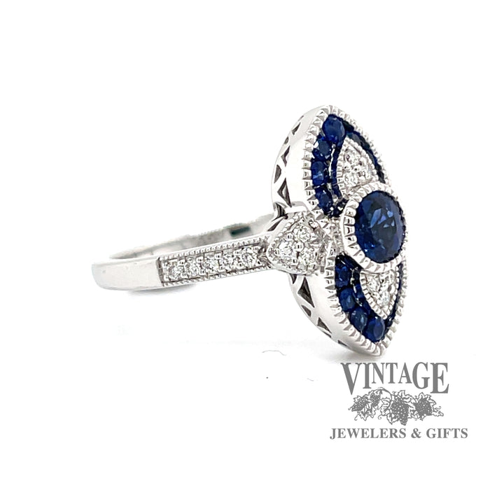 14 karat white gold .63 carat total weight natural blue sapphire and diamond ring, angled view