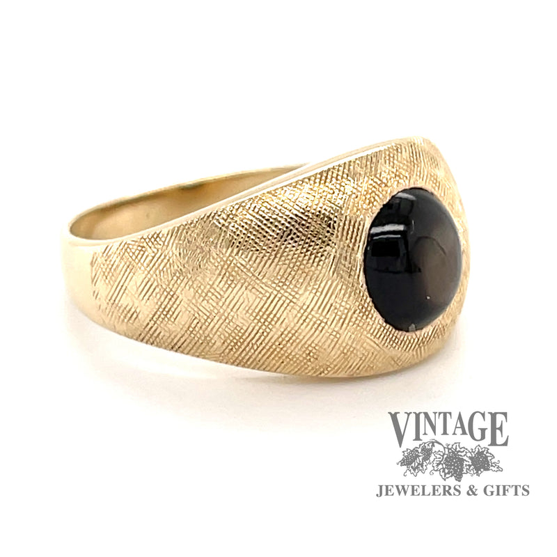 14 karat yellow gold Black star sapphire florentine ring, angled view