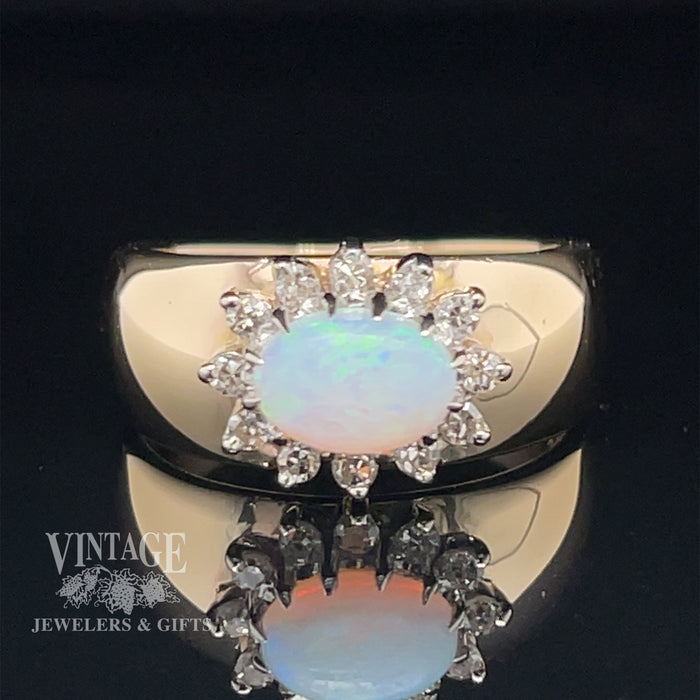 14 karat yellow gold opal and diamond sideways halo ring