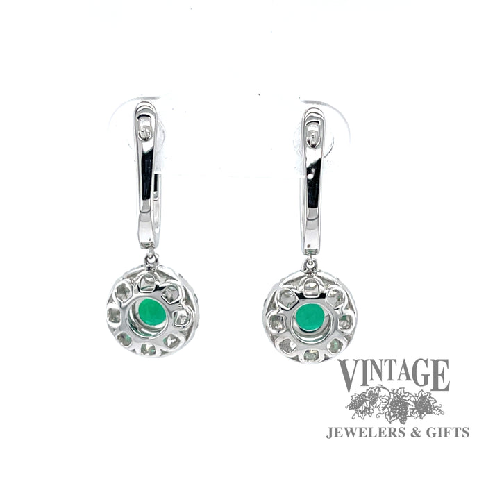 Vivid emerald and sparkling diamond drop earrings.