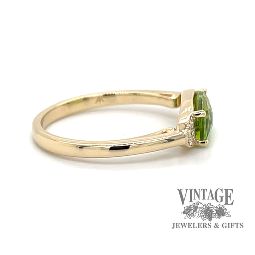 14 karat yellow gold East-West 1.32ct peridot and diamond ring, side view