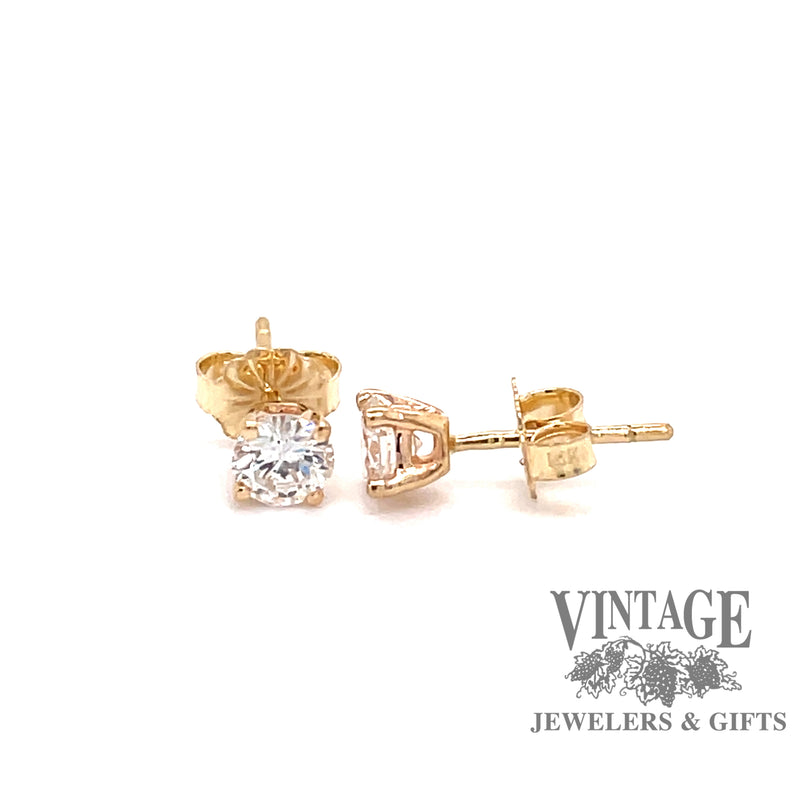 14 karat yellow gold .66 carats total weight diamond stud earrings