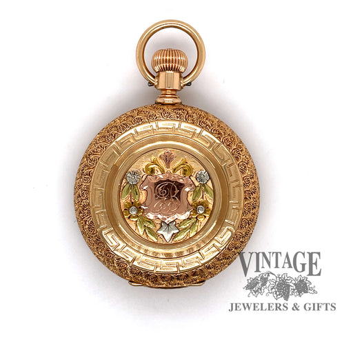 American Waltham Pocket watch in 14k multi color gold case, front cover featuring cartouche and Initial.