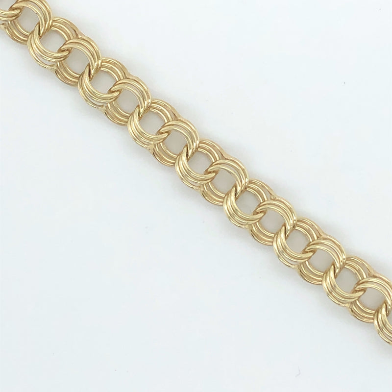 Yellow gold triple link charm bracelet