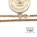 14 karat yellow gold estate tinsel link twist 18" neck chain, close up, shown next to quarter for size reference