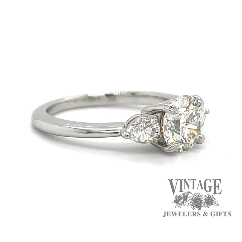 Platinum 1.28ctw round and pear-shape 3-diamond ring, angled view