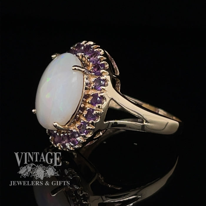 10 karat yellow gold white opal and amethyst halo ring, angled view