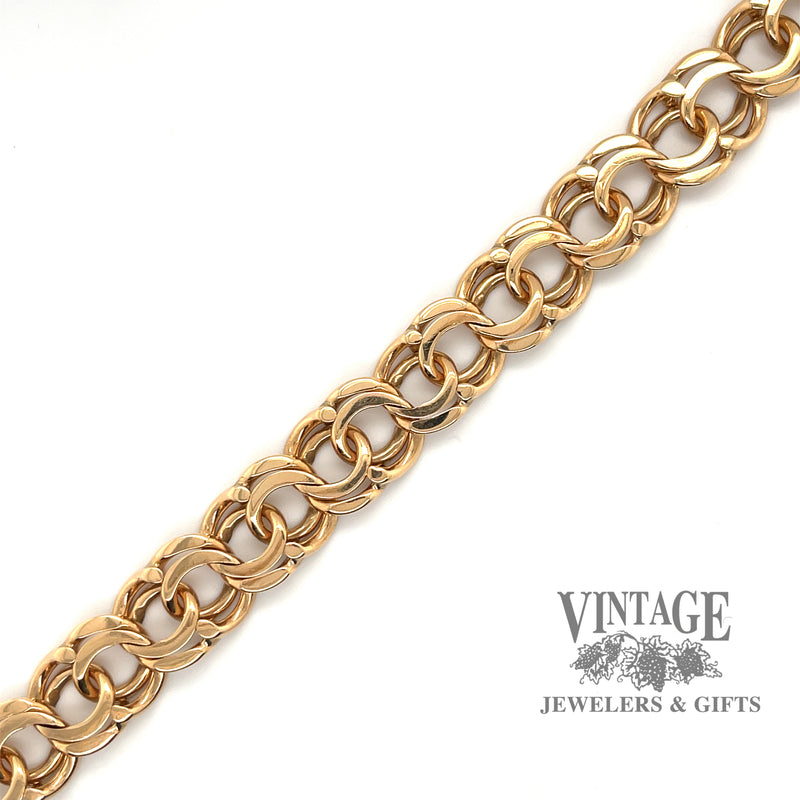 18 karat yellow gold 8-7/8" heavy bismarck link bracelet.