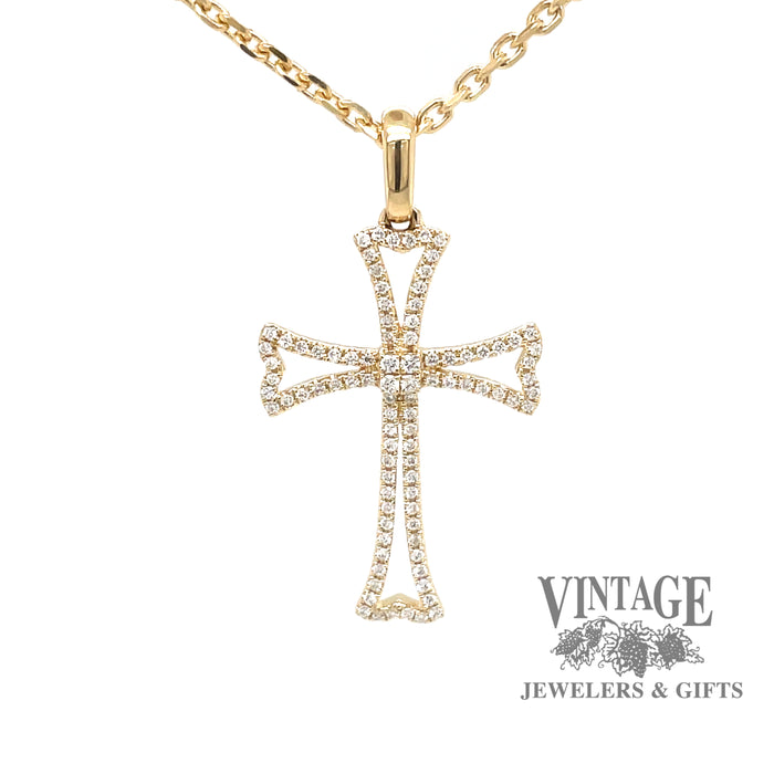 14 karat yellow gold  diamond outlined cross