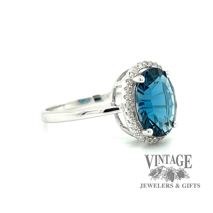 London Blue topaz and diamond 14kw gold halo ring