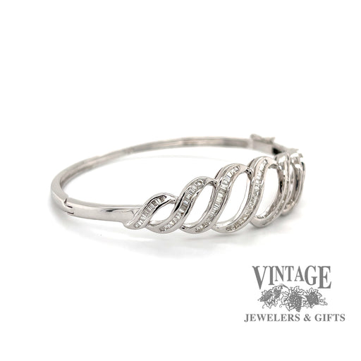 14 karat white gold 3 carat total weight baguette diamond hinged bangle bracelet, angled view