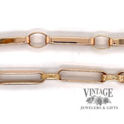 Vintage 14k gold pocket watch chain and mourning fob, showing detail of links.