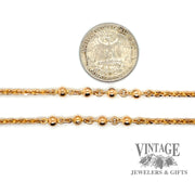 24” 4.3 mm bead station 21ky gold chain quarter for scale