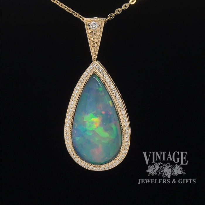 14 karat yellow gold 9.63ct Pear shape opal with diamonds pendant
