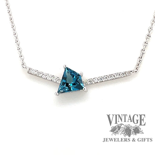 14 karat white gold Kite shape blue topaz and diamond bar necklace