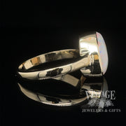 Natural white opal in 14ky gold ring side