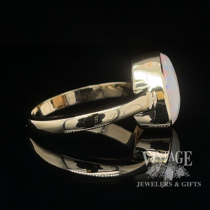 Natural white opal in 14ky gold ring side