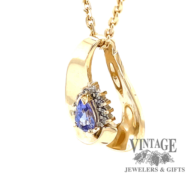14 karat yellow gold tanzanite slide pendant with halo diamonds, side view