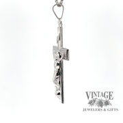 Side view of 14 karat white gold crucifix