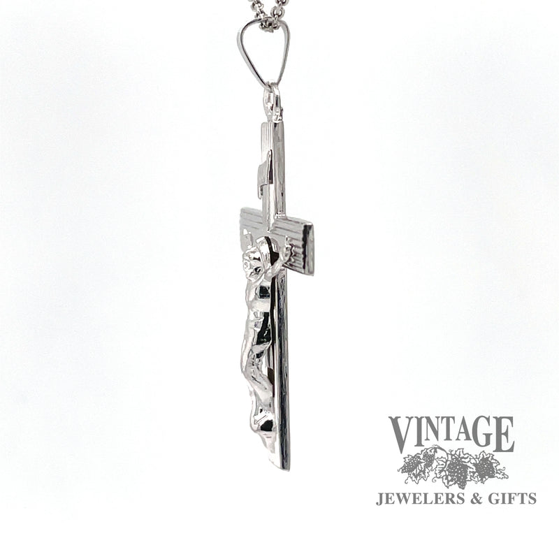 Side view of 14 karat white gold crucifix