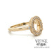 14 karat yellow gold oval semi-mount engagement ring, angled view