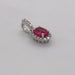 White gold  pink spinel diamond halo pendant, angled top/side view.