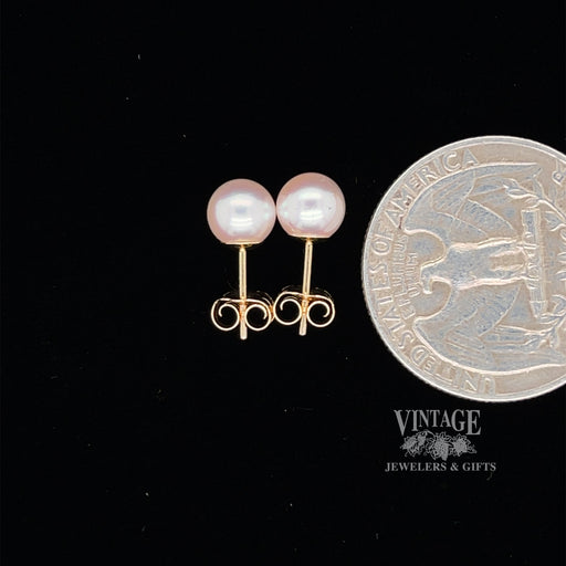 6mm Akoya pearl 14ky gold stud earrings quarter for scale